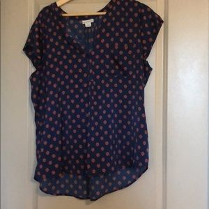 Navy and orange patterned blouse